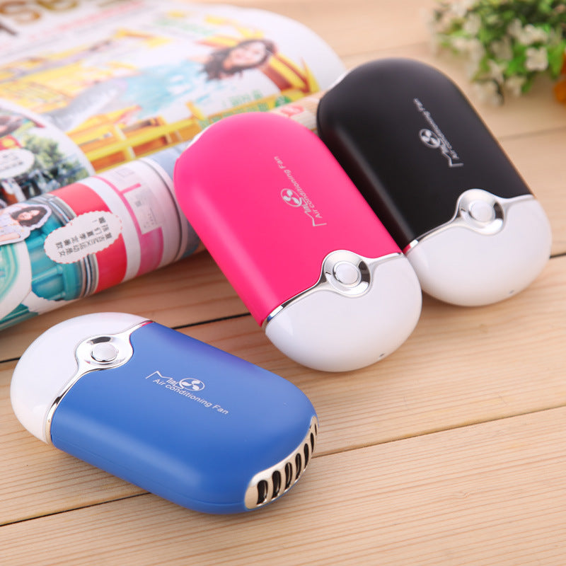 ArcticBreeze™ Pro Mini Handheld Fan | Portable Cooling & Aromatherapy